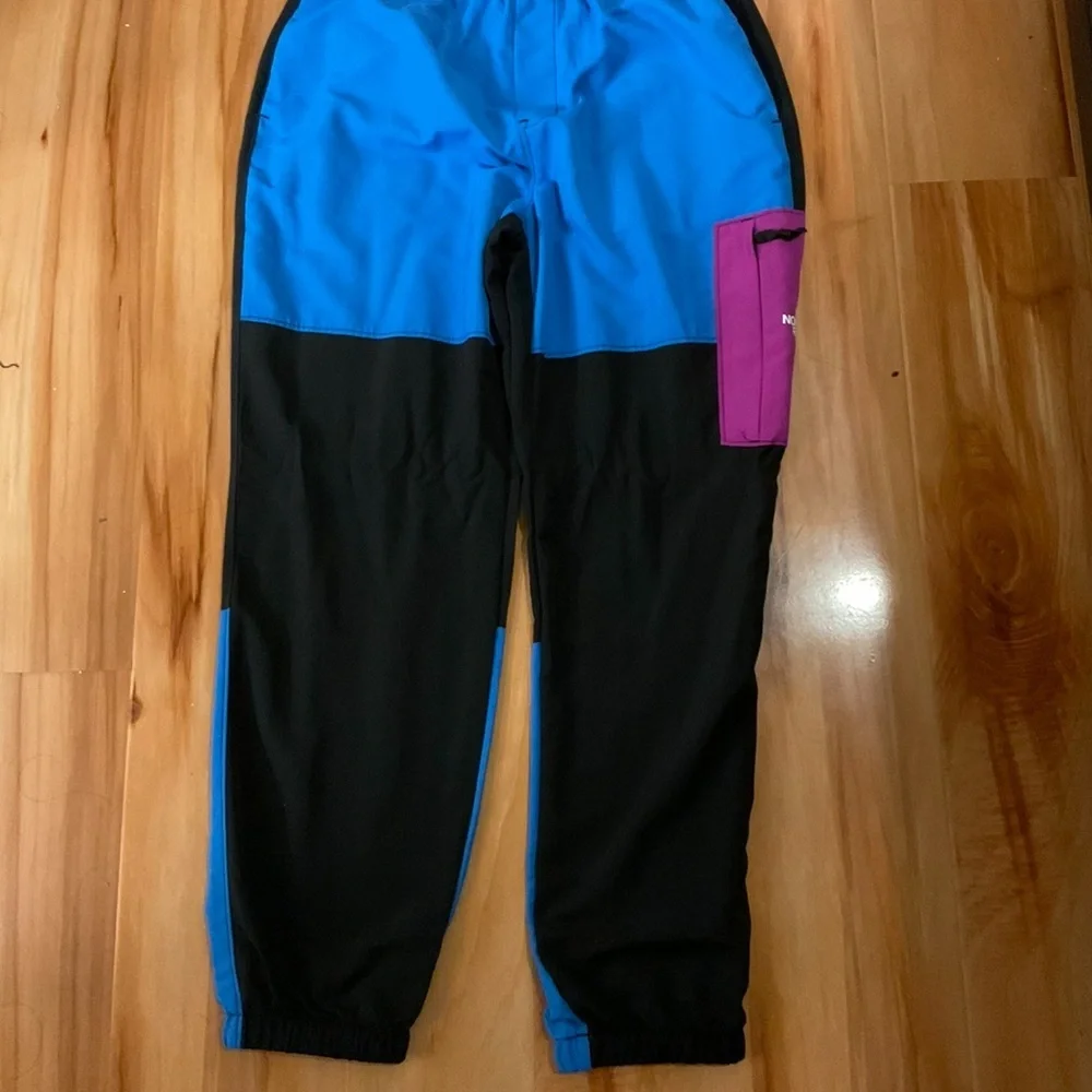 The North Face Men’s Colorblock Sweatpants in Blue, Black & Purple
